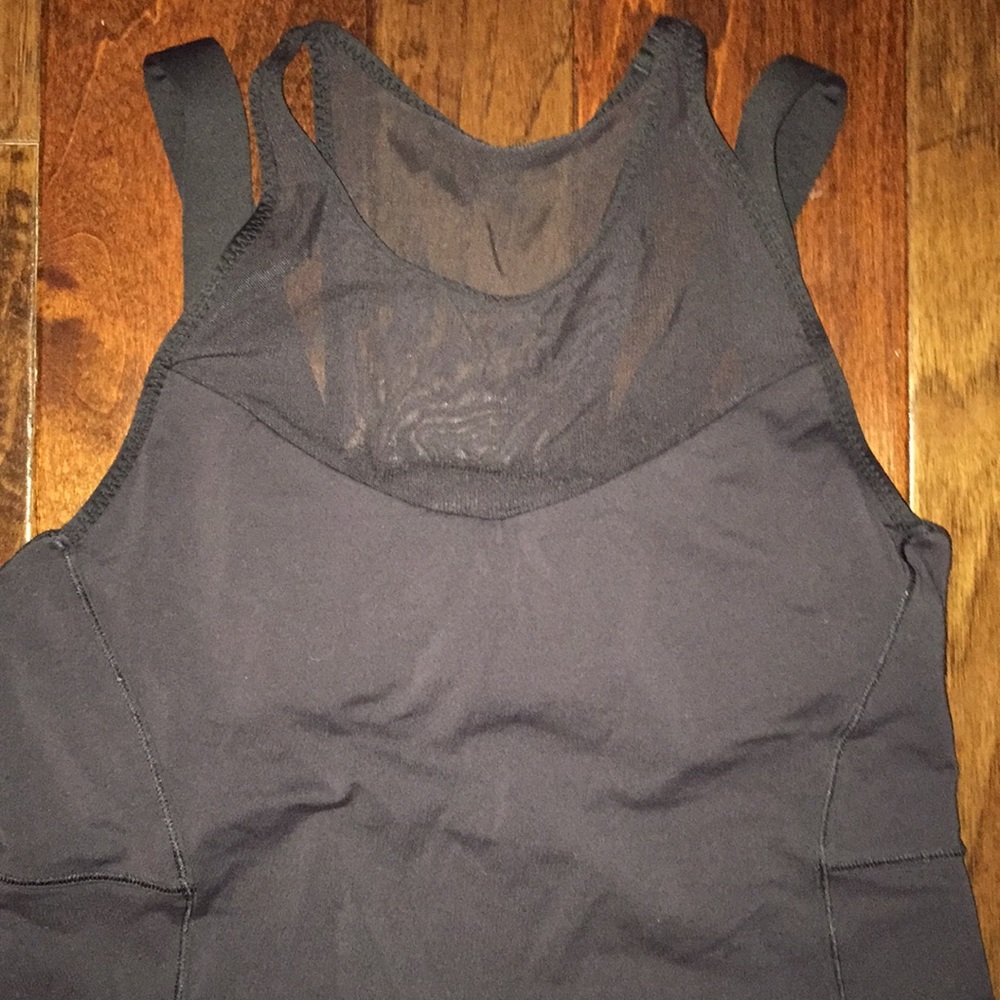Athletic mesh top gently used size 8.